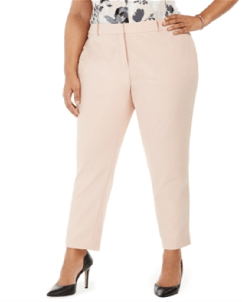 Front of a model wearing a size 24W Calvin Klein Women's Slim It Straight Leg Dress Pants Pink 24W in Pink by Calvin Klein. | dia_product_style_image_id:307362
